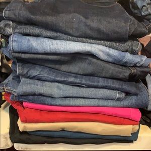 Bundle of jeans and dress pants
